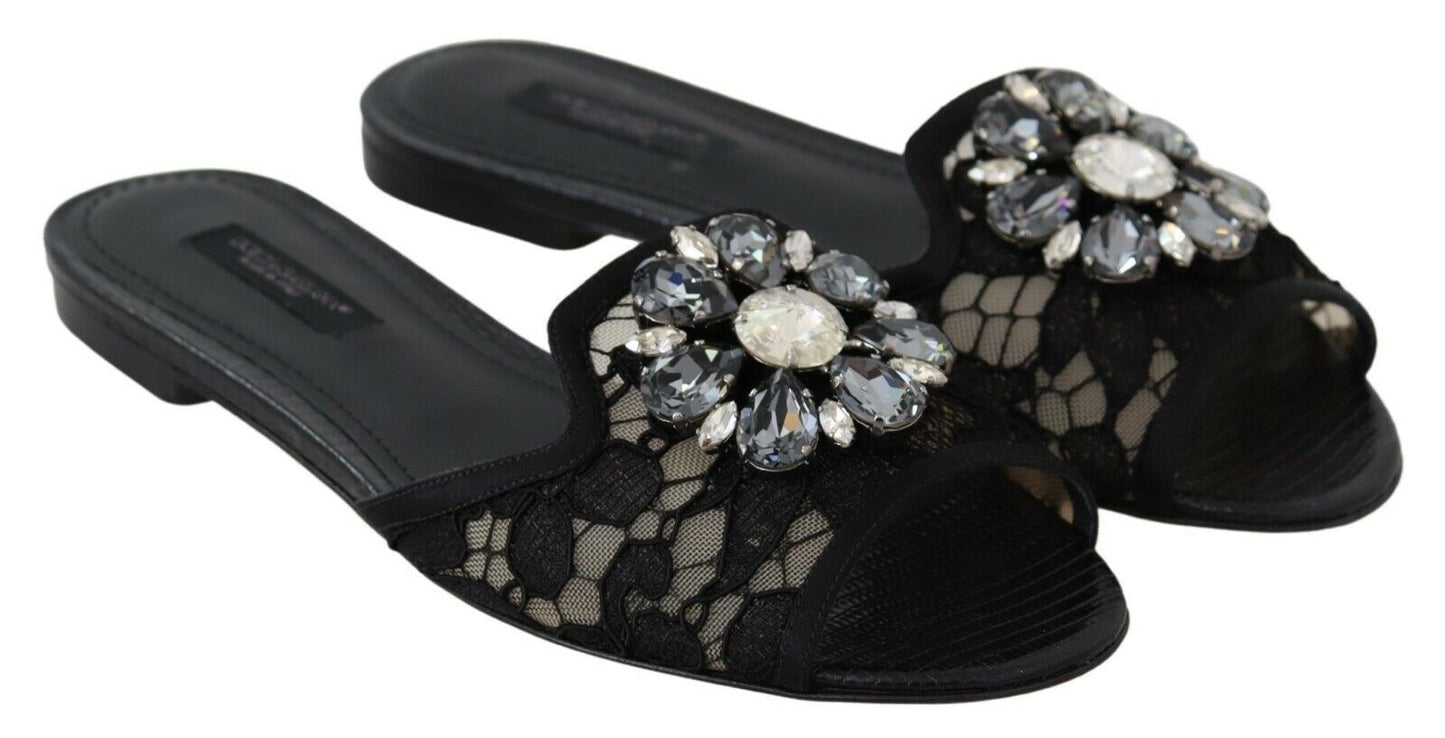 Elegantes mules de encaje negro con detalle de flor joya