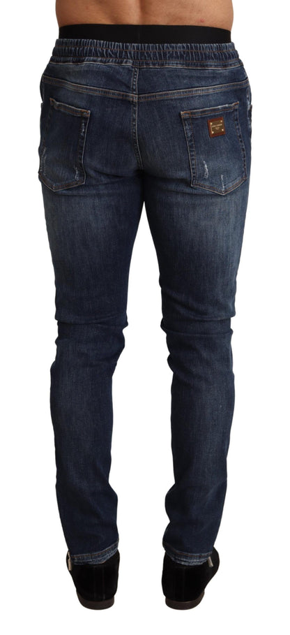 Elegantes jeans ajustados de color azul oscuro