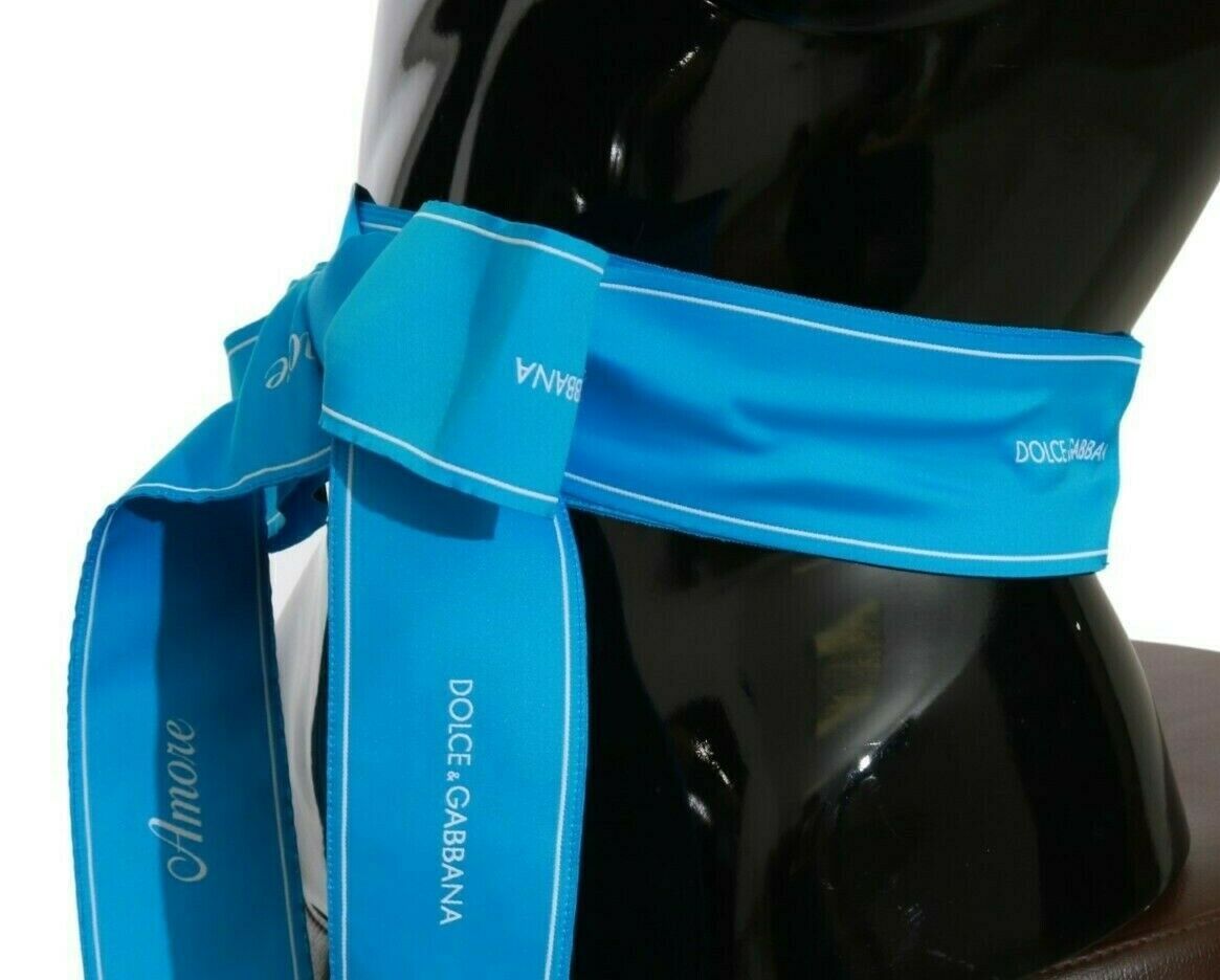 Cinturón elegante con lazo y broche azul