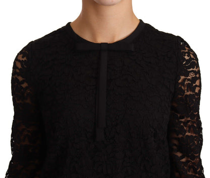 Elegante blusa de manga larga con encaje floral negro