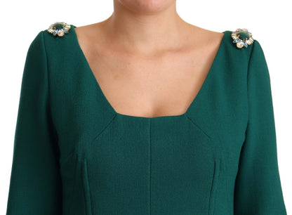 Vestido midi verde esmeralda con broche de cristal