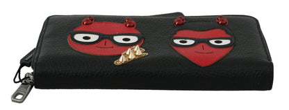 Elegante cartera continental de piel negra y roja