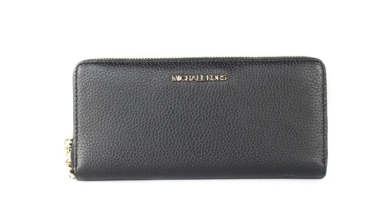Cartera de muñeca continental Jet Set Travel grande de piel de guijarro negra