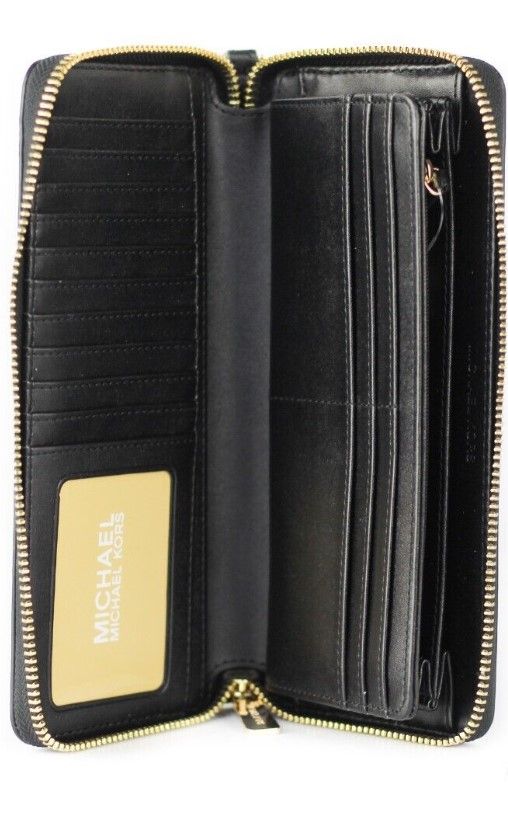 Cartera de muñeca continental Jet Set Travel grande de piel de guijarro negra
