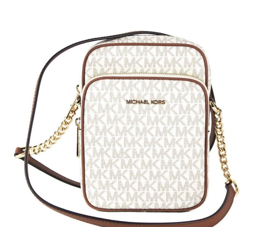 Bolso bandolera Jet Set mediano de PVC color vainilla con cadena North South