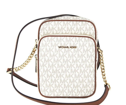 Bolso bandolera Jet Set mediano de PVC color vainilla con cadena North South