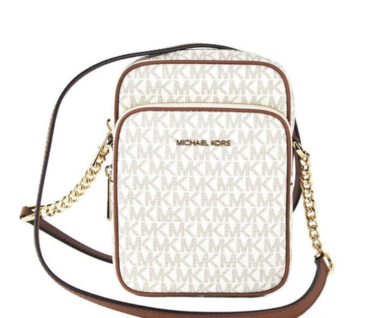 Bolso bandolera Jet Set mediano de PVC color vainilla con cadena North South