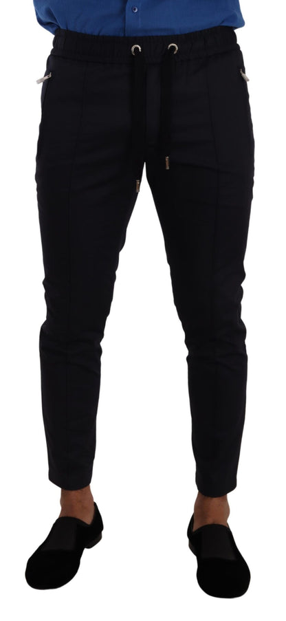 Elegantes pantalones deportivos ajustados de color azul oscuro