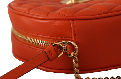 Elegante bolso bandolera redondo de piel napa