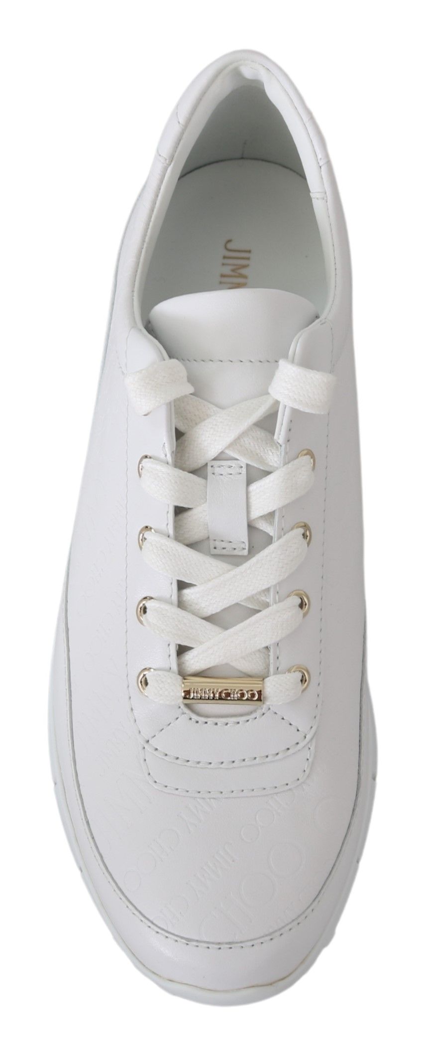 Elegantes zapatillas blancas de piel