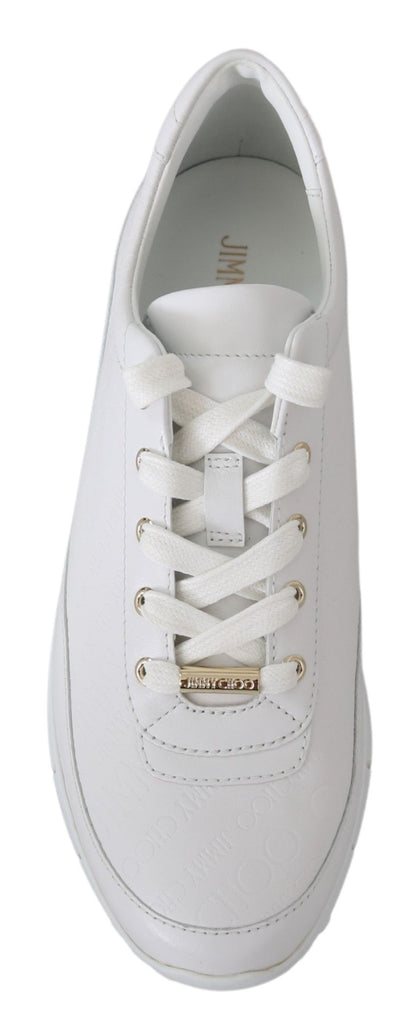 Elegantes zapatillas blancas de piel