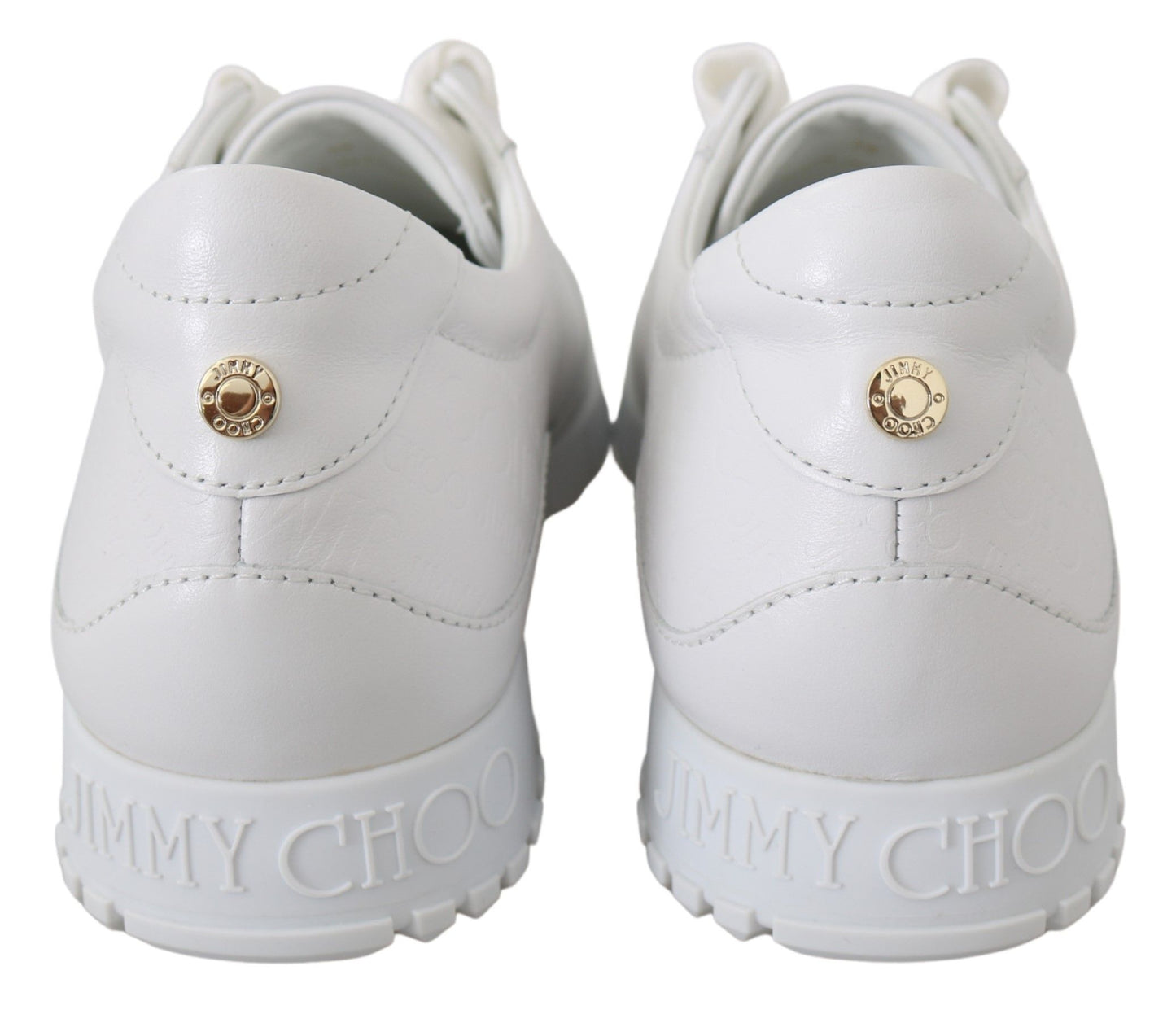 Elegantes zapatillas blancas de piel