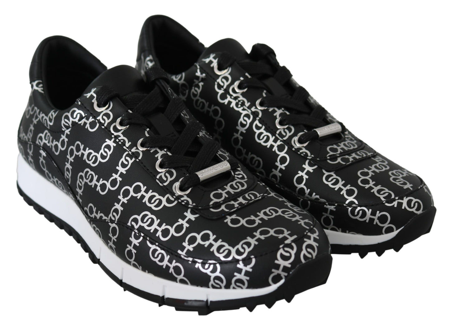 Elegantes zapatillas de piel negras y plateadas