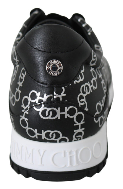 Elegantes zapatillas de piel negras y plateadas