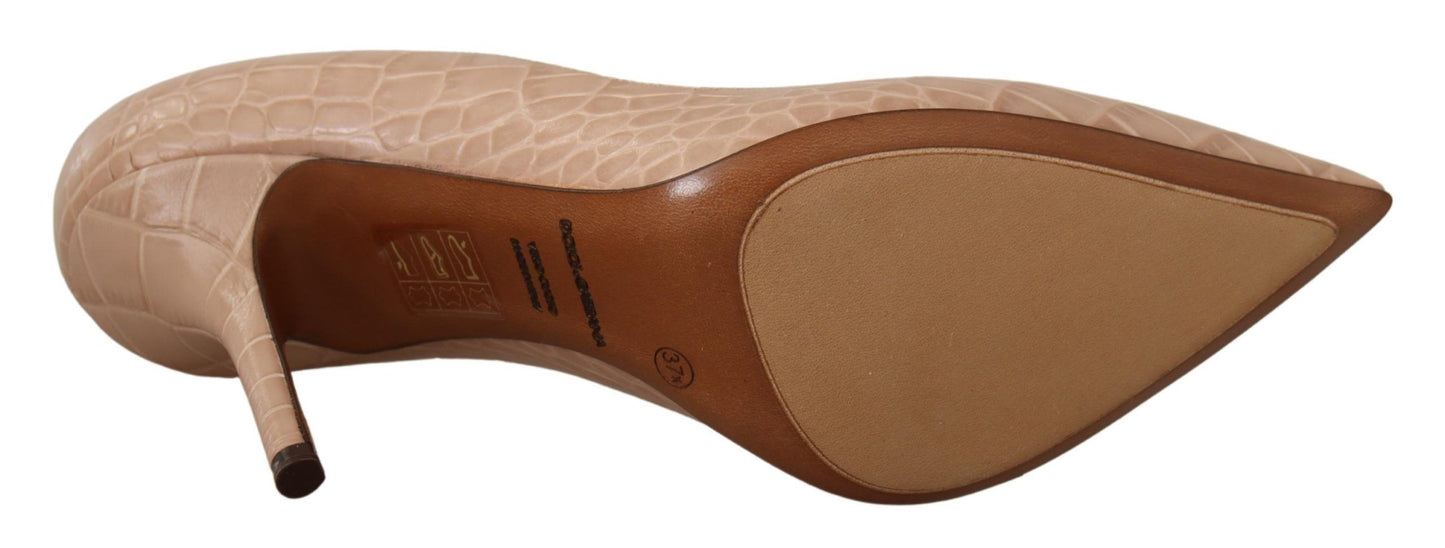 Elegantes zapatos de tacón bajo de piel color piel