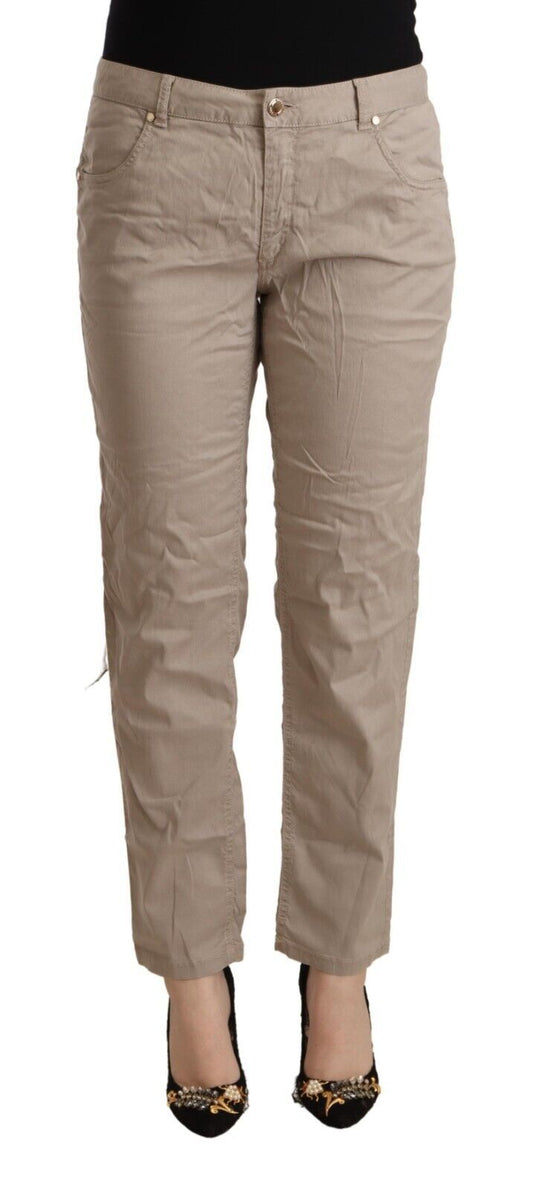 Pantalones beige de cintura media y cónicos