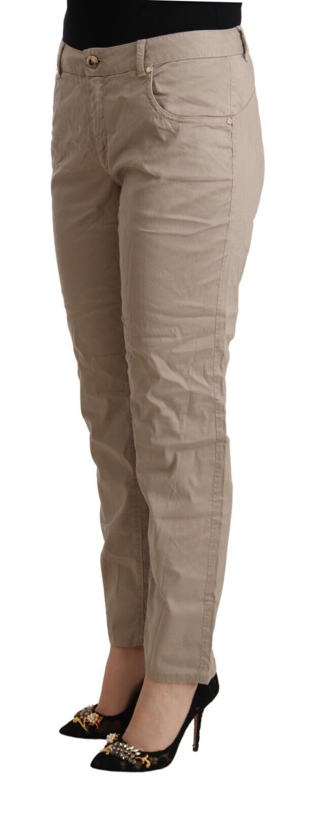 Pantalones beige de cintura media y cónicos