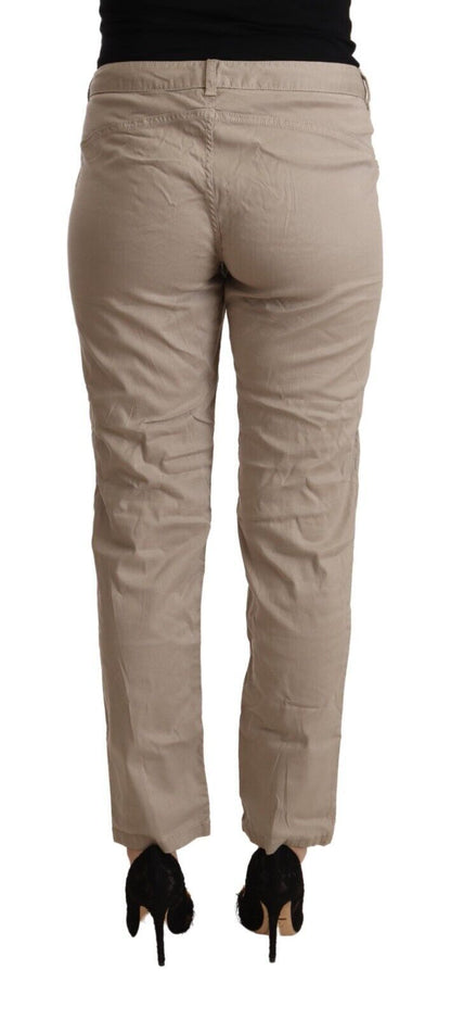 Pantalones beige de cintura media y cónicos