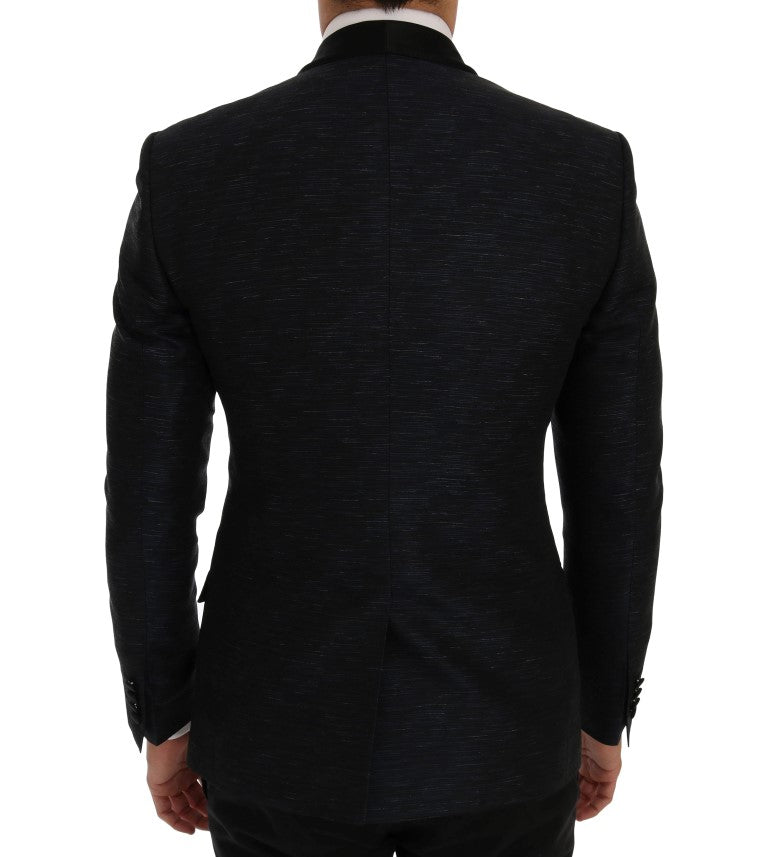 Elegante conjunto de traje azul y negro de corte entallado