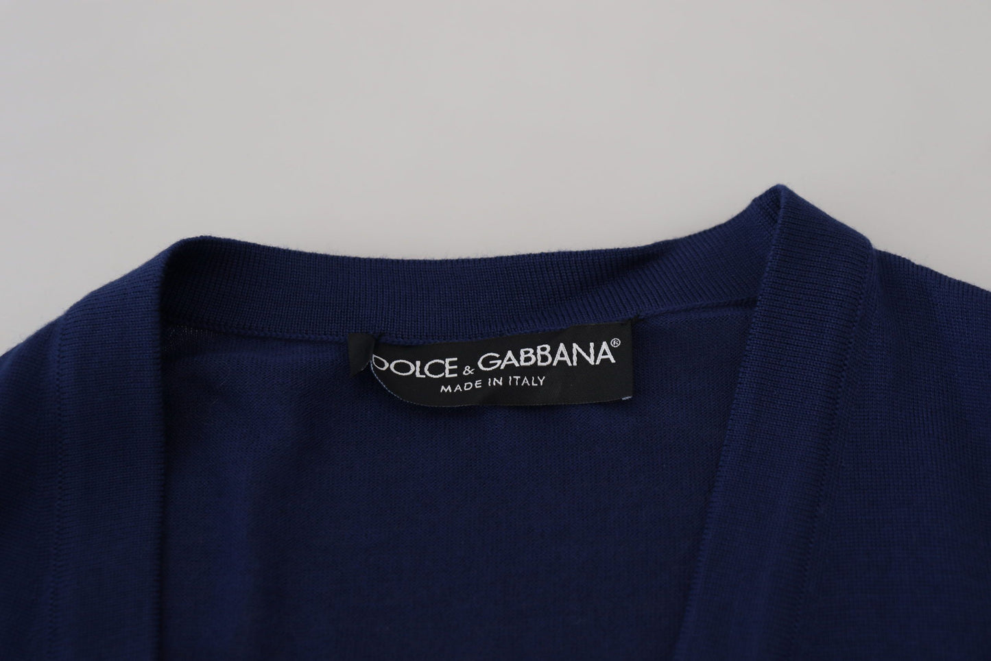 Elegante suéter tipo cárdigan azul de lana virgen
