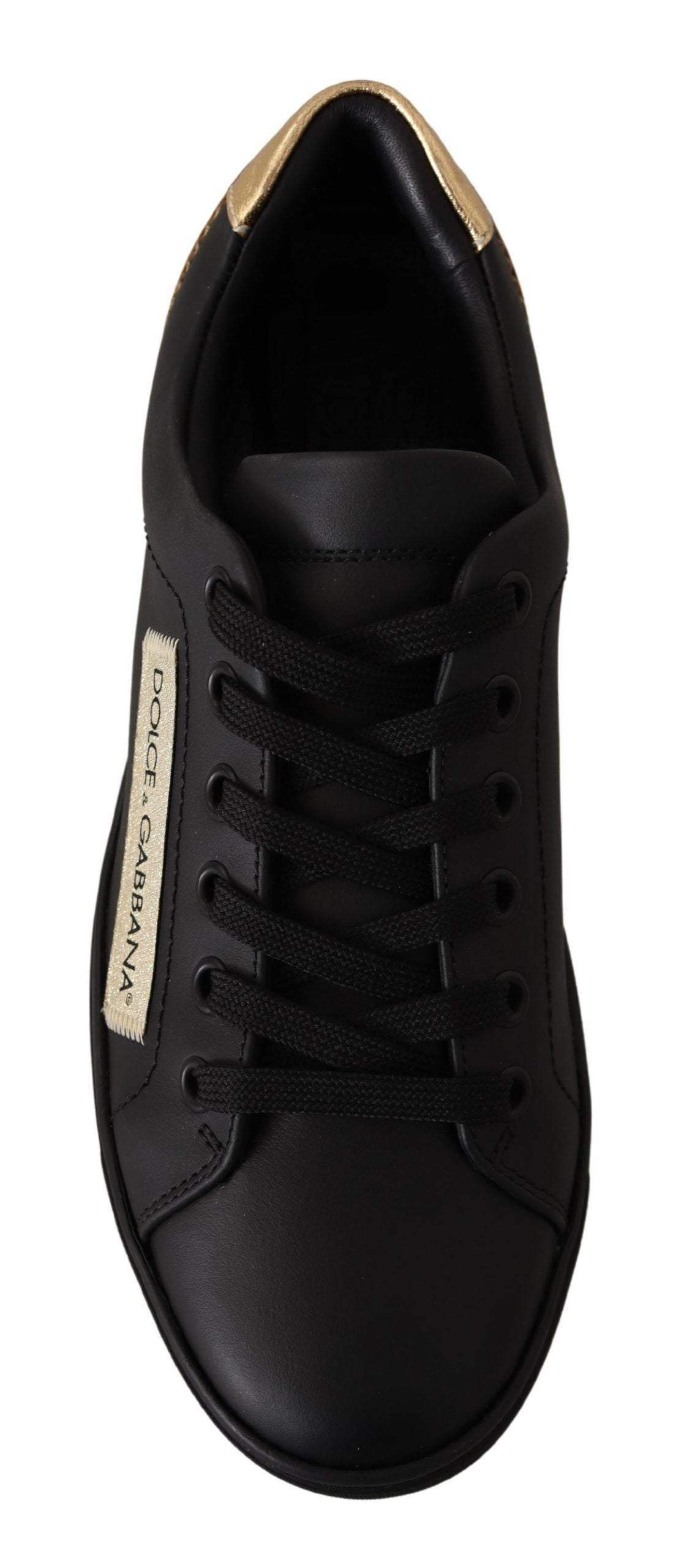 Zapatillas bajas elegantes de cuero negro y dorado