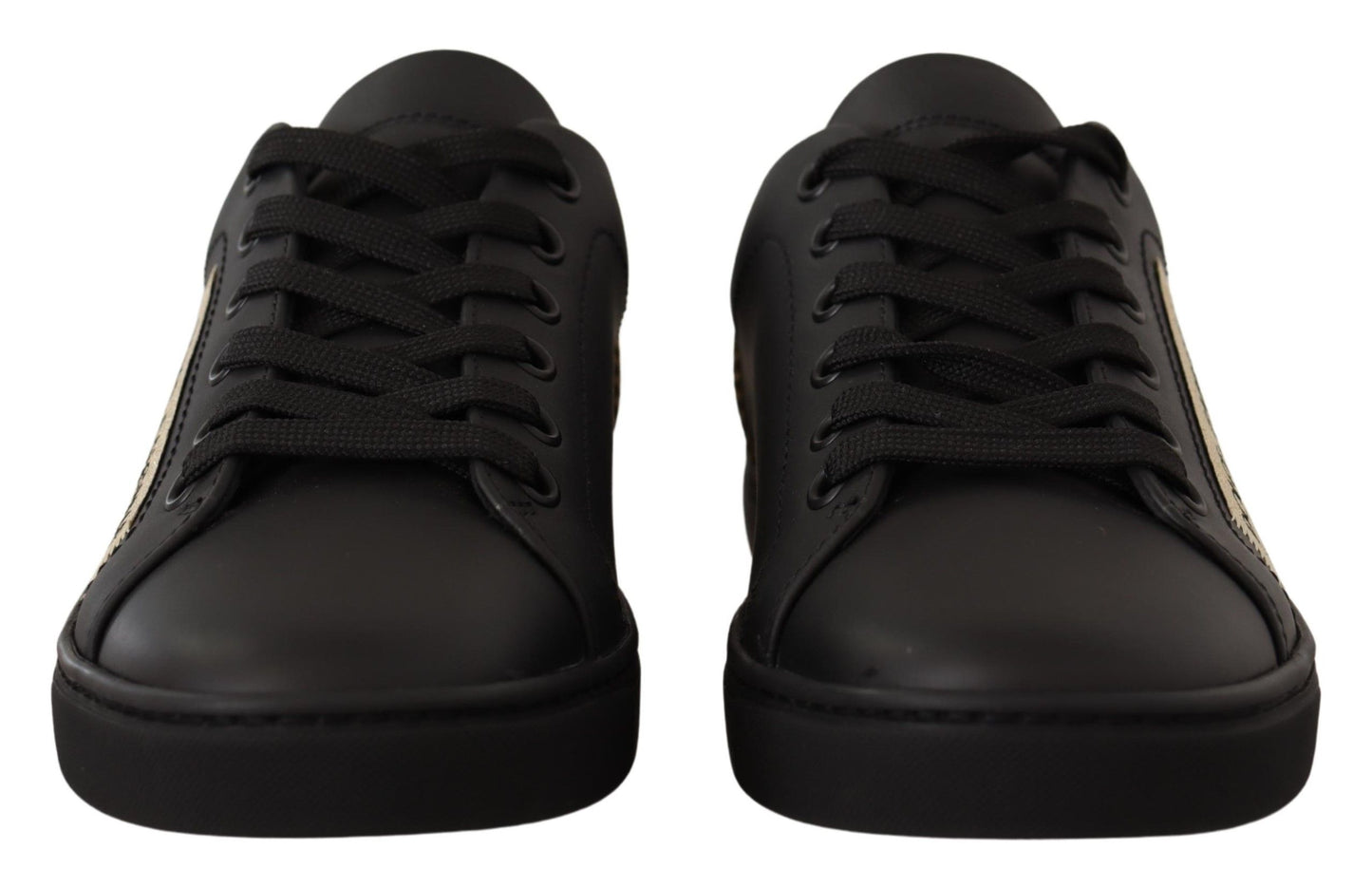 Zapatillas bajas elegantes de cuero negro y dorado