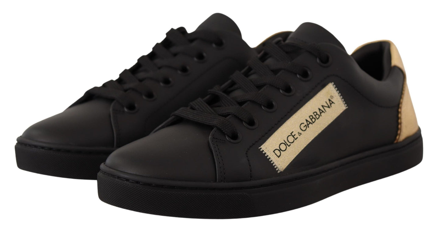 Zapatillas bajas elegantes de cuero negro y dorado