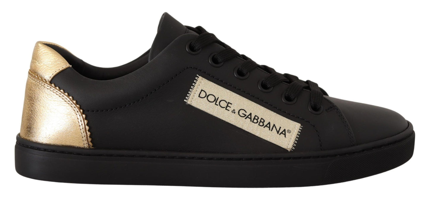 Zapatillas bajas elegantes de cuero negro y dorado