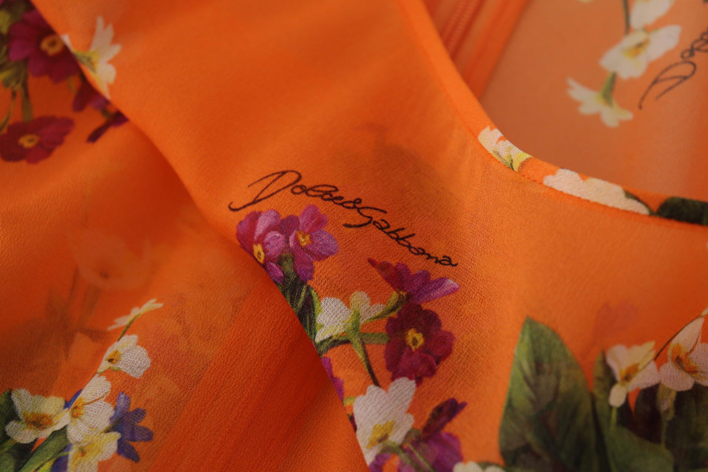 Elegante blusa de seda floral con cremallera en la espalda