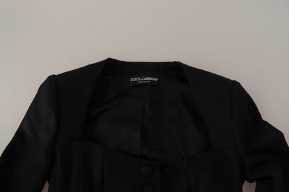 Chaqueta elegante negra con broches y forro de seda