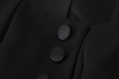 Chaqueta elegante negra con broches y forro de seda