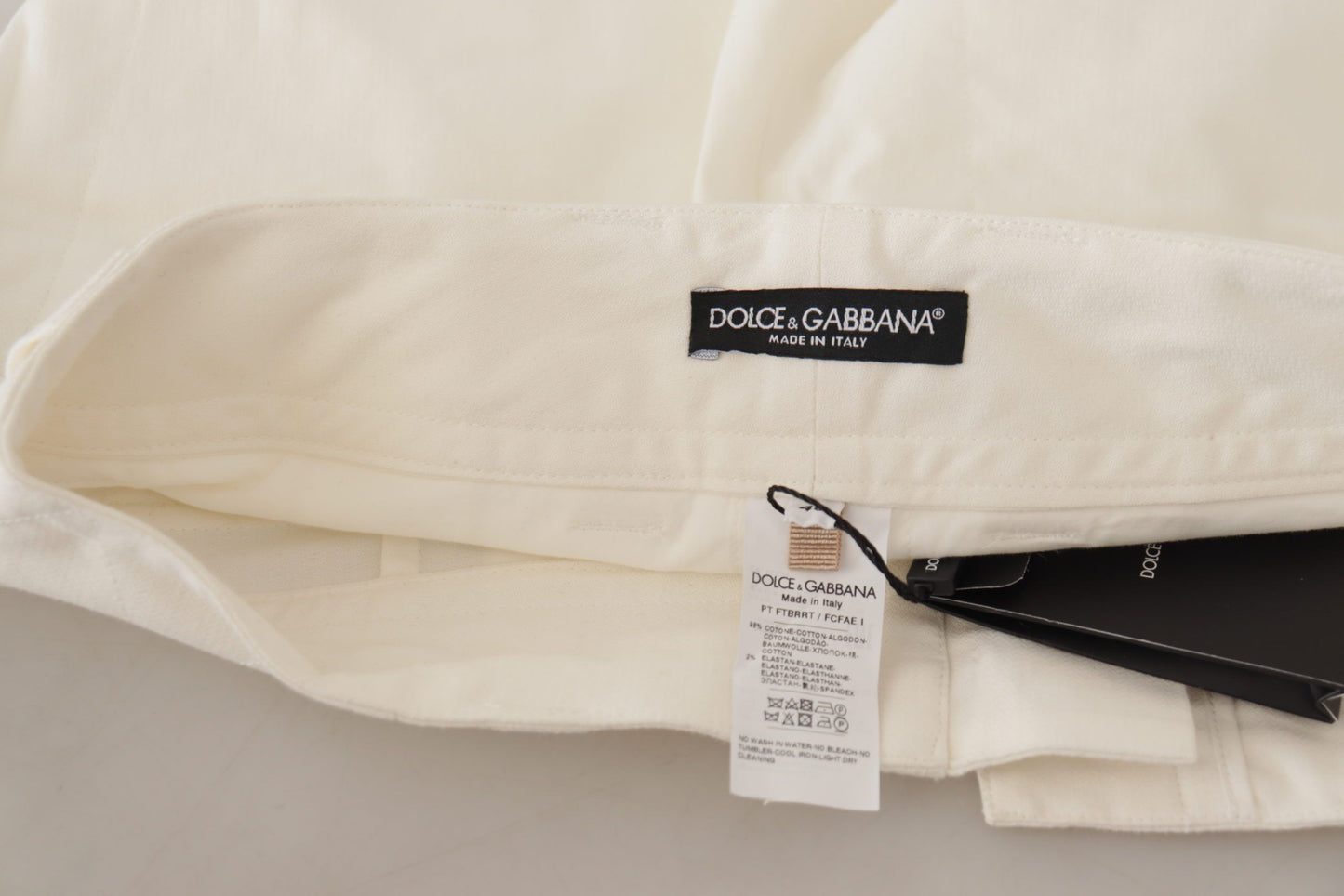 Pantalones elegantes blancos de cintura alta y corte cónico