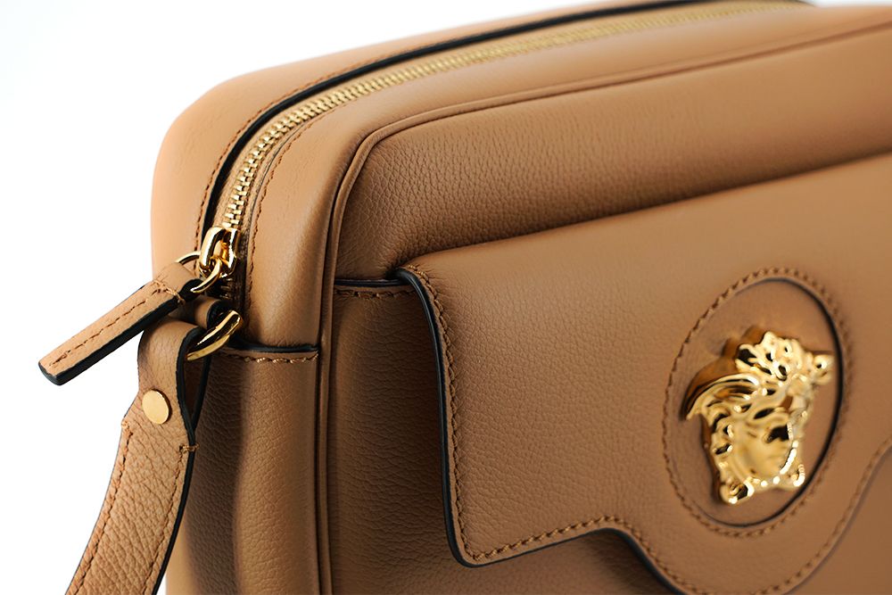 Elegante bolso de hombro de cuero marrón para cámara