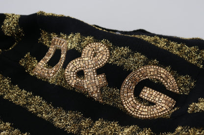 Elegante suéter de cristales negros y dorados