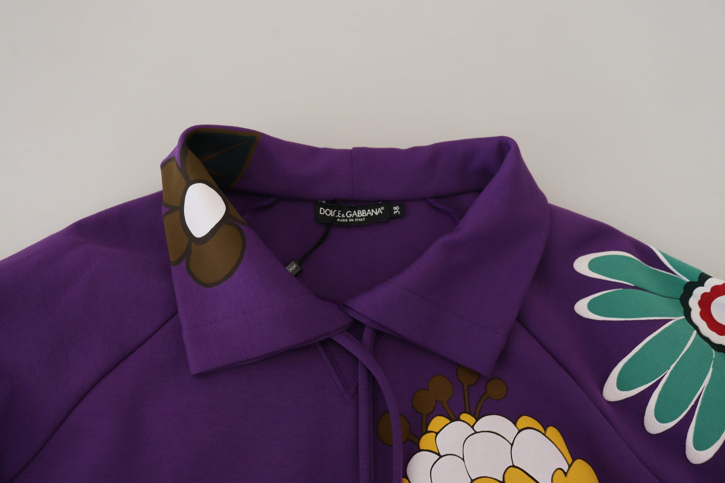 Elegante suéter morado con estampado floral