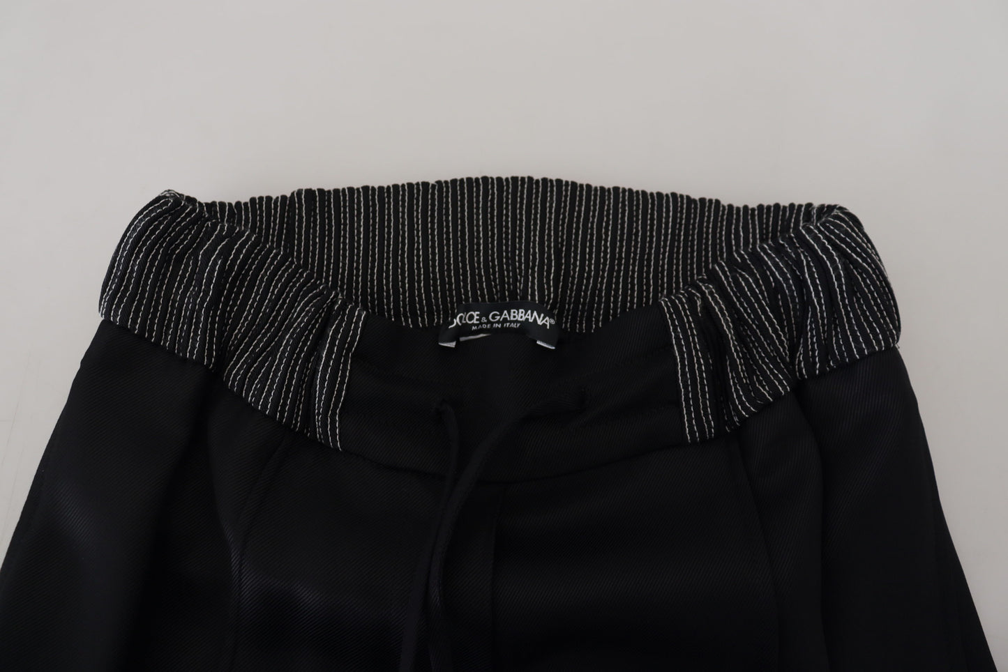 Pantalones elegantes de algodón negro