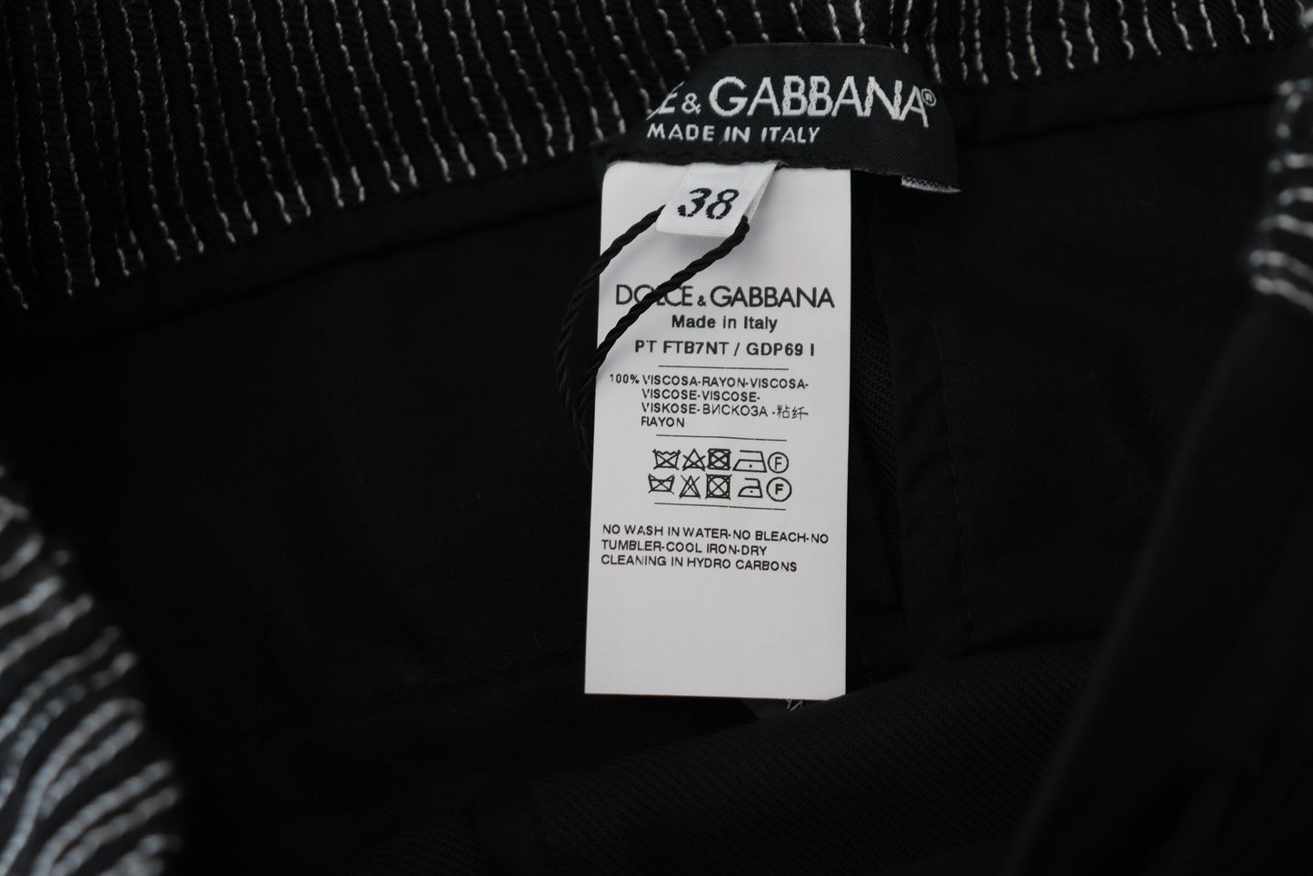 Pantalones elegantes de algodón negro