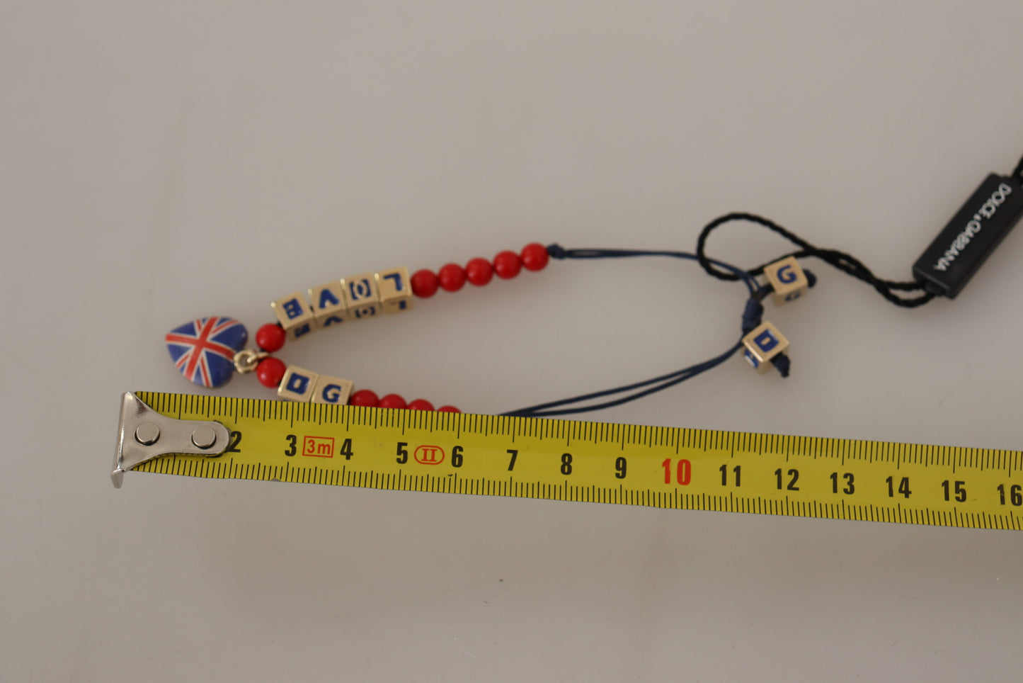 Elegante pulsera de cristal azul, rojo y zamak