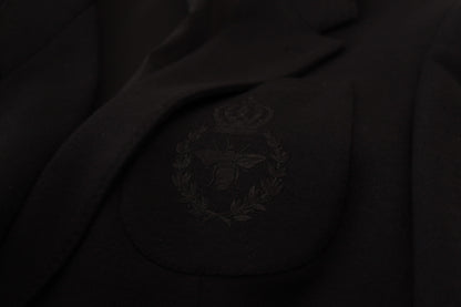Elegante blazer de lana negra de botonadura sencilla