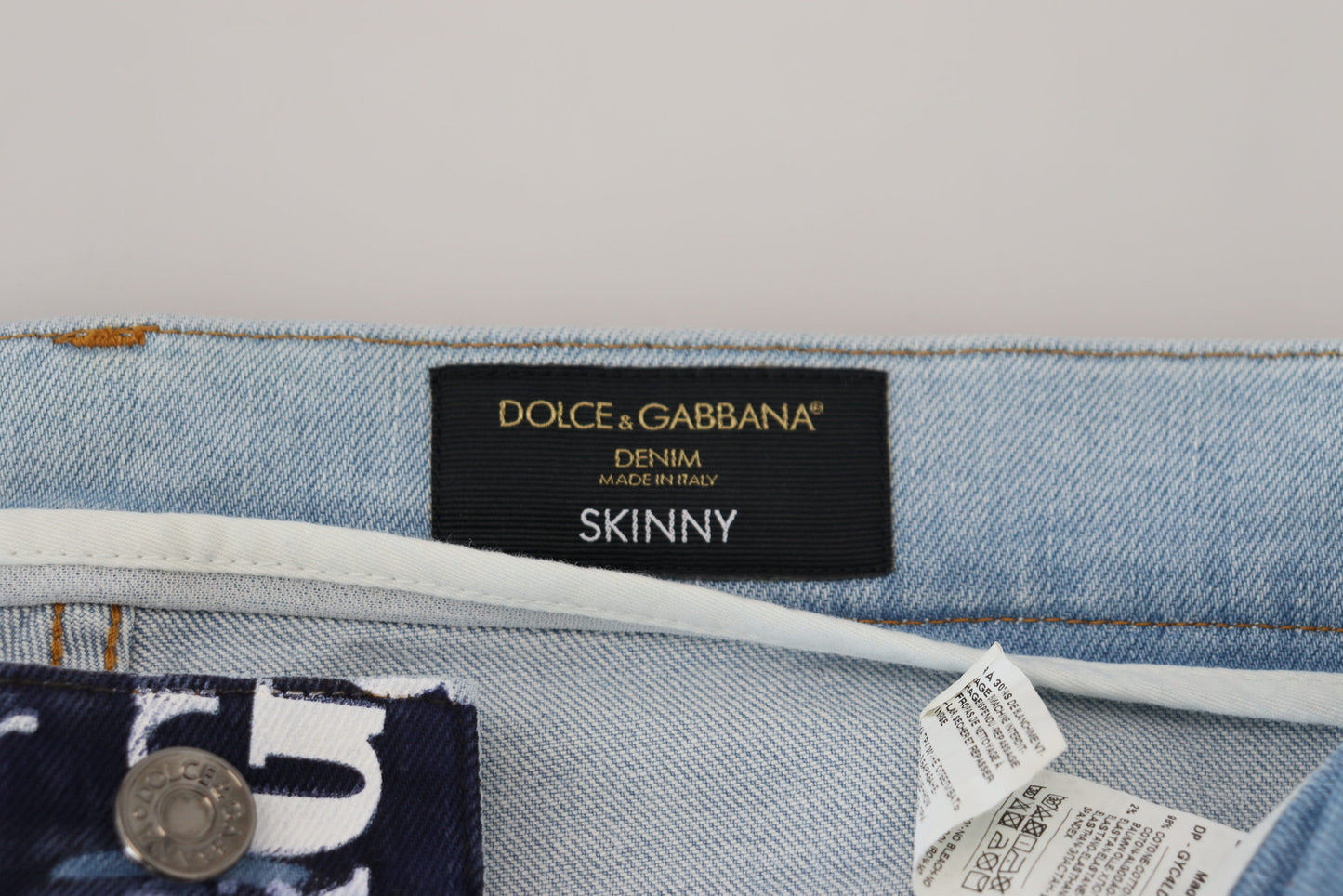 Pantalones vaqueros elegantes con estampado de corona