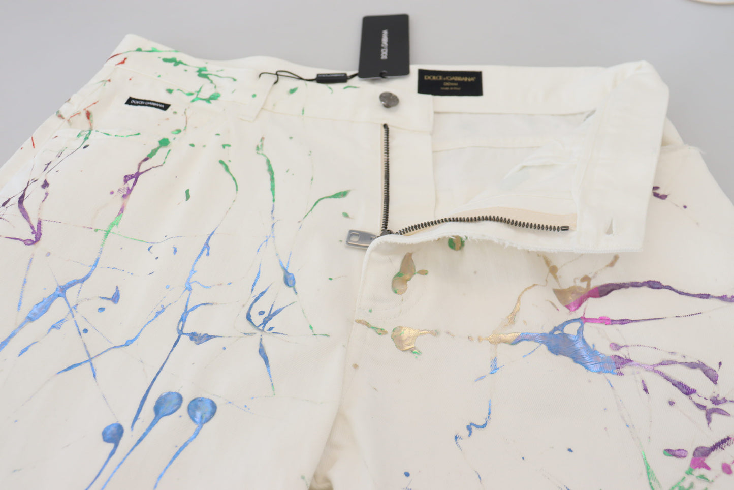 Pantalones vaqueros elegantes con estampado de salpicaduras blancas