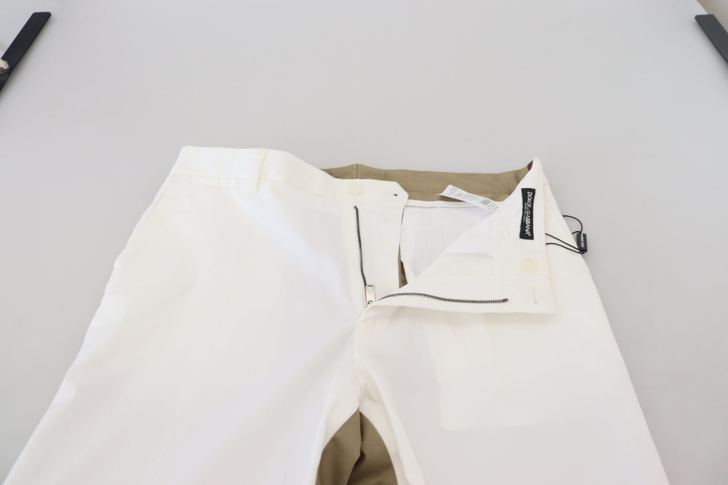Pantalones elegantes de algodón en dos tonos blanco y marrón
