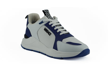 Elegantes zapatillas de piel azul y blanca