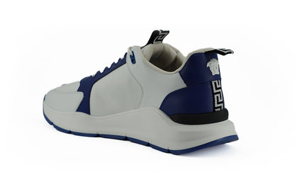 Elegantes zapatillas de piel azul y blanca