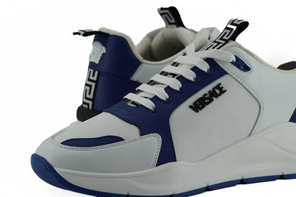 Elegantes zapatillas de piel azul y blanca