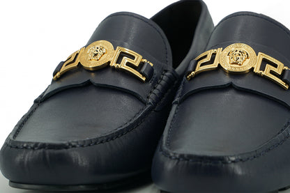 Elegantes mocasines de piel de becerro azul marino