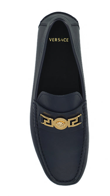 Elegantes mocasines de piel de becerro azul marino