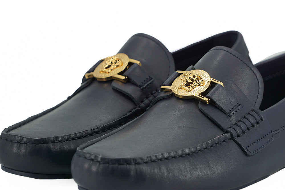 Elegantes mocasines de piel de becerro azul marino