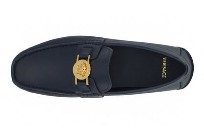 Elegantes mocasines de piel de becerro azul marino