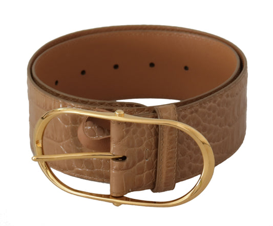 Elegante cinturón de piel beige con hebilla grabada